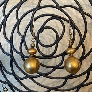 Large Gold ball earrings.